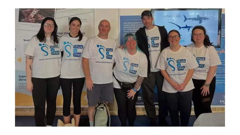 Brave Fundraisers Dive With Sharks for Cerebral Palsy Charity