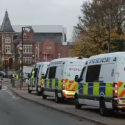Major Police Incident in Aston: Heavily Armed Officers Seal Off Residential Street