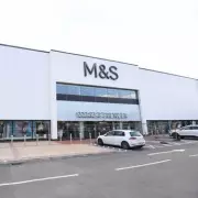 M&S 'Sultry' Black Satin Dress Wows Shoppers by Gliding Over Curves