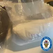 Police raid in Birmingham seizes gun, drugs and illegal alcohol