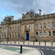 Walsall Man Charged After Alleged Knife Threats to Householders in Shocking Street Incident