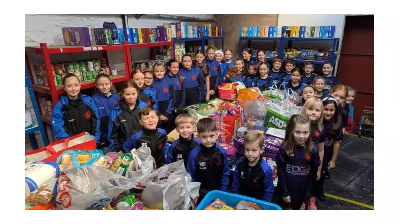 Penrhyn Bay FC Juniors Smash Record with 870+ Food Bank Donations