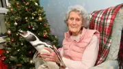 101-Year-Old Doris Switches on Christmas Lights with Penguin Pals