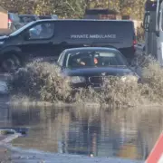 Birmingham road floods after deluge: Drivers ignore police warning