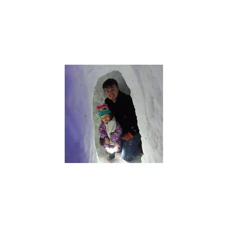 Dad Builds Amazing Igloo with Fireplace for Toddler in Orkney Snow