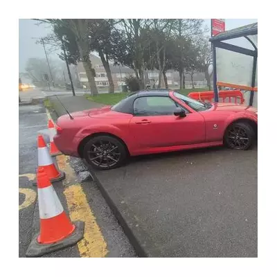 Car Crashes into Sutton Coldfield Bus Stop: No Injuries Reported