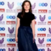 Bridgerton's Claudia Jessie Reveals Her 'Addictive' Bag Essential: Sol de Janeiro Scent