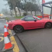 Car Crashes into Sutton Coldfield Bus Stop: No Injuries Reported