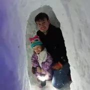 Dad Builds Amazing Igloo with Fireplace for Toddler in Orkney Snow