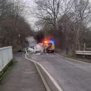 Fire Crews Tackle Burning Fly-Tipping Piles Blocking West Midlands Road