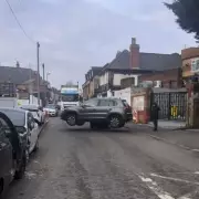 Forklift driver moves parked car blocking lorry in Birmingham