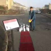 Man Turns Pothole into Bowling Alley in 'Great British Bowl-Off' Protest