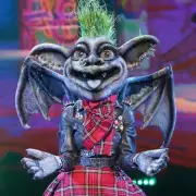Masked Singer's Gargoyle 'Nailed' as Fans Decode Clues Pointing to 90s Icon