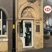 Vandals Target HSBC Birmingham Branch with Red Graffiti and Smashed Windows