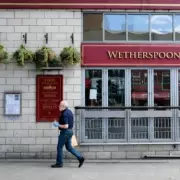 Wetherspoons Sells Six UK Pubs Amid £45 Million Cost Surge and Profit Warning
