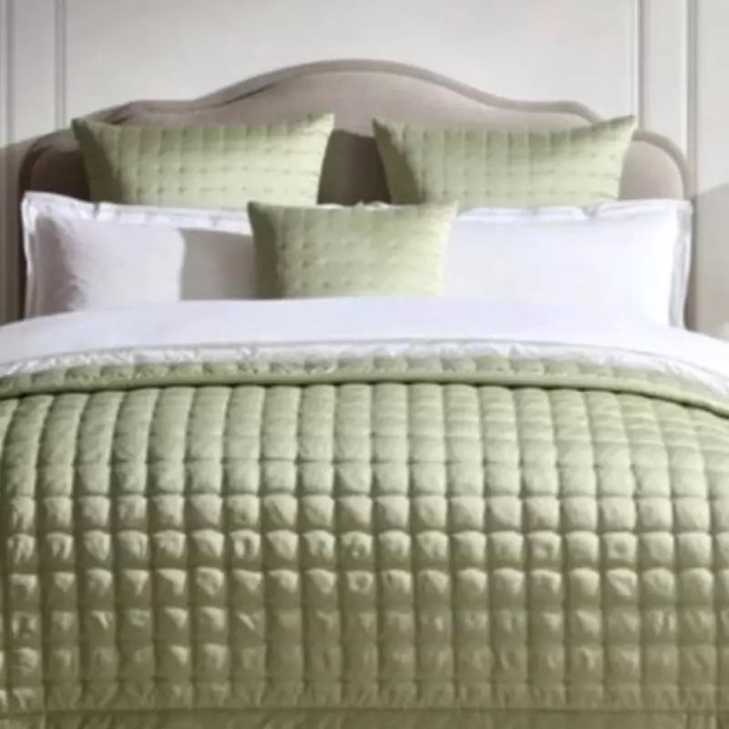 Dusk's 'Hotel-Like' Quilted Satin Throw Slashed to £20 in Sale