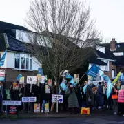 Union Celebrates Deal Saving Teachers' Jobs and Boosting School Funding