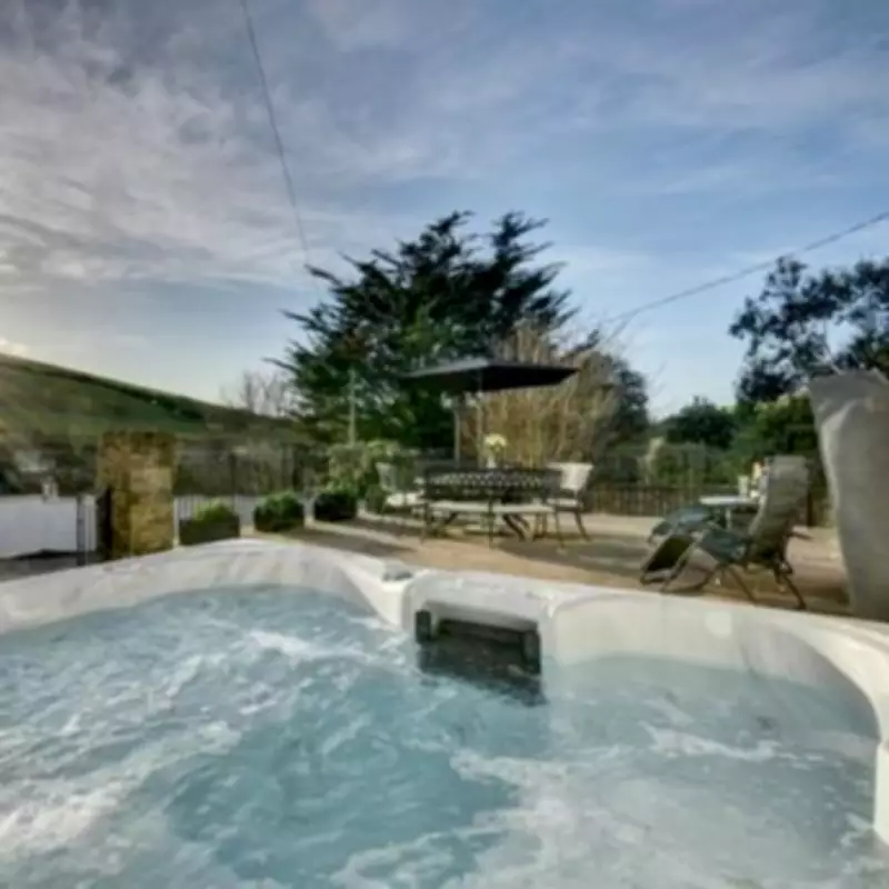 Dog-Friendly Devon Chalet Offers Privacy, Hot Tub, and Stunning Country Views