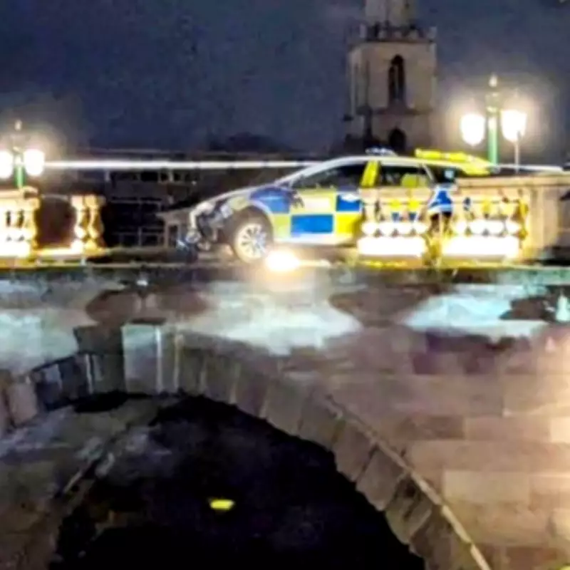 Police Car Left Dangling Over Edge of Historic Worcester Bridge After Crash