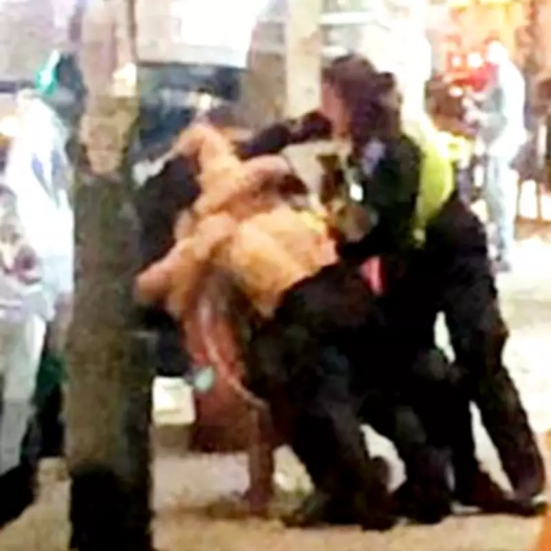 Shirtless Man Grapples with Police During Selly Oak Arrest After Jumping on Cars