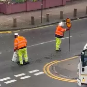 Birmingham Pothole Gets Temporary Fix, Residents Criticize Repair Quality