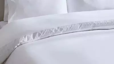 Dusk Slashes Prices on 'Very Classy' Alma Bedding, Offering Silk-Like Luxury