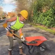 Bikini-clad driver's pothole protest demands proper road repairs from councils