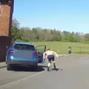 Disqualified Driver Jumps from Moving Car During Police Chase