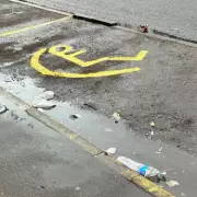 DIY Disabled Parking Sign Painted on Birmingham Street Sparks Viral Outrage
