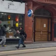Mysterious 'Pied Piper' Captivates Birmingham with Street Music and Dance
