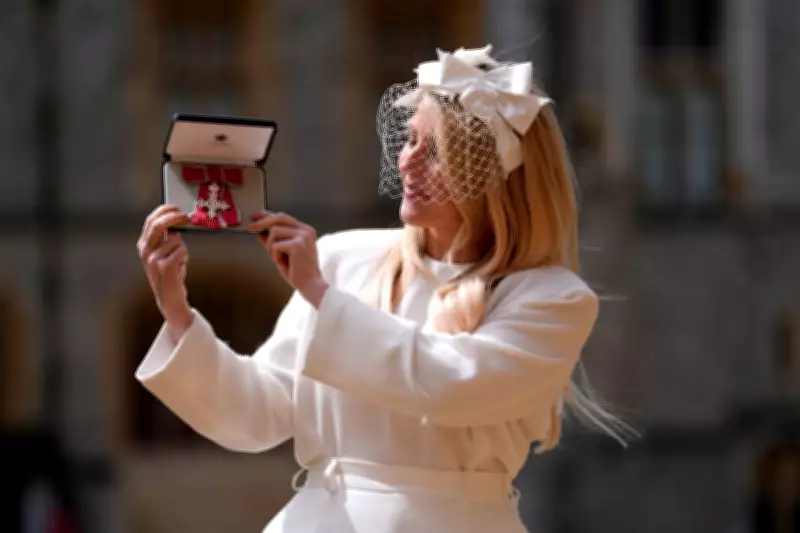 Ellie Goulding Receives MBE from Prince William at Windsor