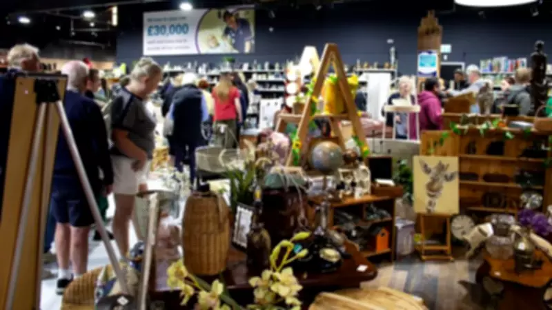 Volunteer at Phyllis Tuckwell's New Charity Shop in Guildford
