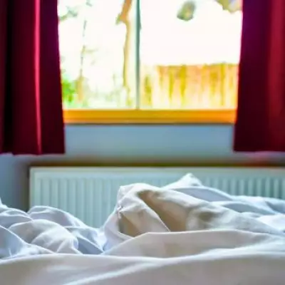 Damp towel trick to cool your bedroom at night without a fan