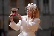 Ellie Goulding Receives MBE from Prince William at Windsor