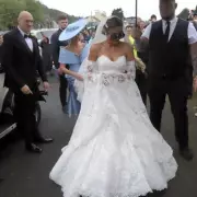 Venezuela Fury Wears White Fishtail Dress and Crocs to Church Wedding