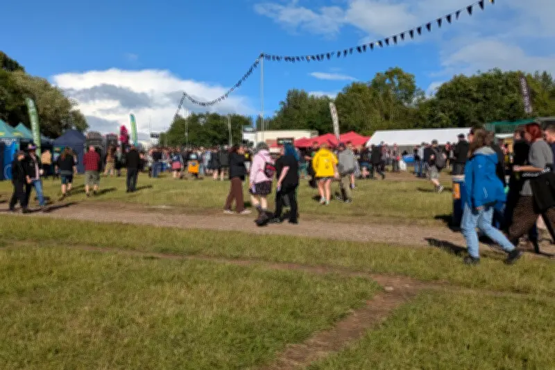 18 Photos Capture Campers Arriving for Download Festival 2026 with Black Country Flag