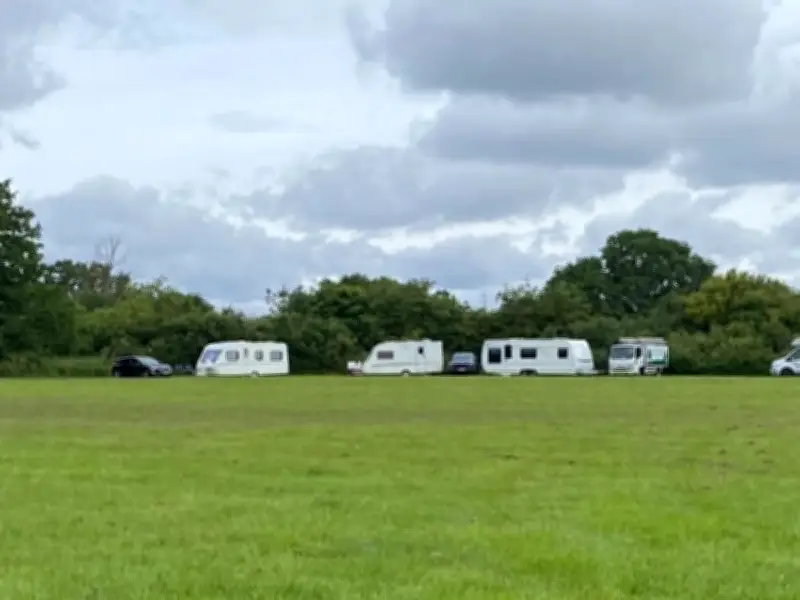 Travellers Take Over Football Field at Woodgate Valley Country Park