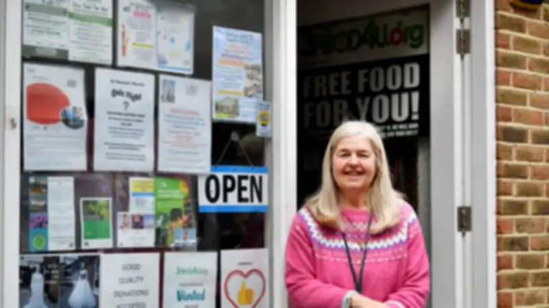 Waltham Abbey Care Home Resident with Dementia Volunteers at Charity Shop