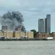 100 Firefighters Tackle Recycling Centre Blaze in Bermondsey, Trains Disrupted