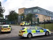 Teen, 14, in court over triple stabbing at Manchester school