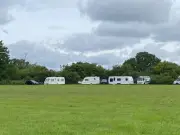 Travellers Take Over Football Field at Woodgate Valley Country Park