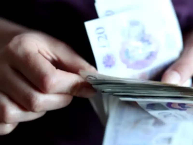 UK Workers Urged to Check Payslip Code for Potential £689 Refund