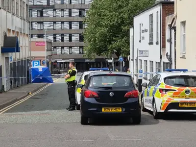 Police Incident in Wolverhampton: Blue Tent Erected, Road Cordoned Off